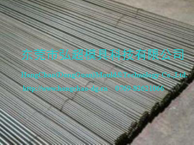 选用空冷微畸变冷作模具钢Cr2Mn2SiWMoV制造细长杆状零件和机床导轨